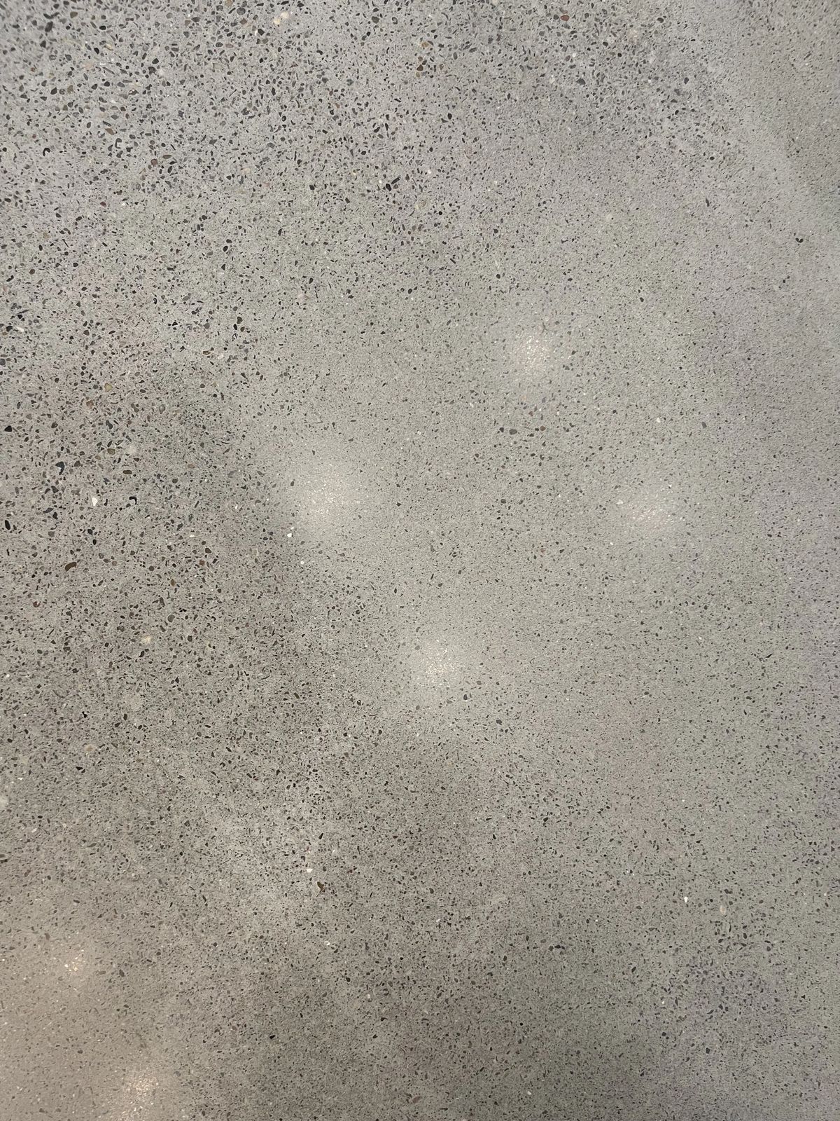 Close-up of decorative flake polyaspartic garage floor coating