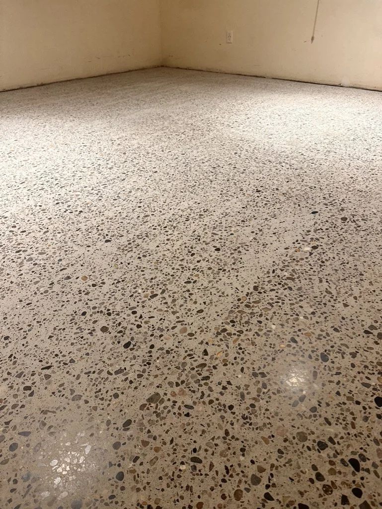Polished concrete floor with glossy reflective finish